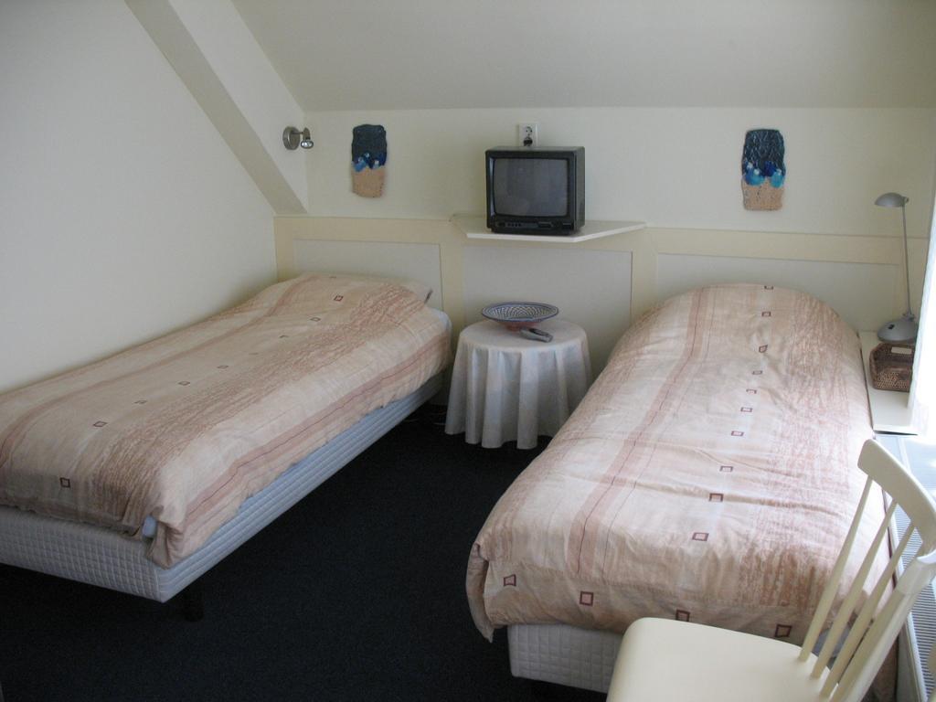 Altijd Zon Bed & Breakfast Ос Стая снимка
